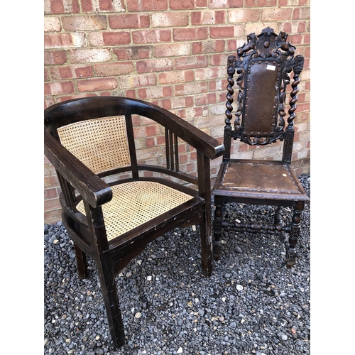 94 - A carved oak chair together with a Bergere tub chair