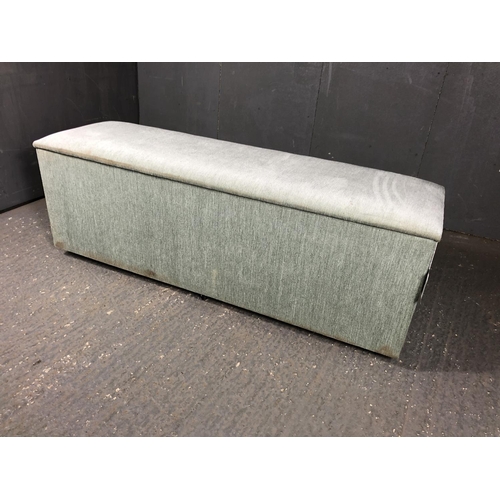 59 - A long blue upholstered blanket box