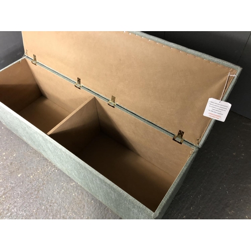 59 - A long blue upholstered blanket box