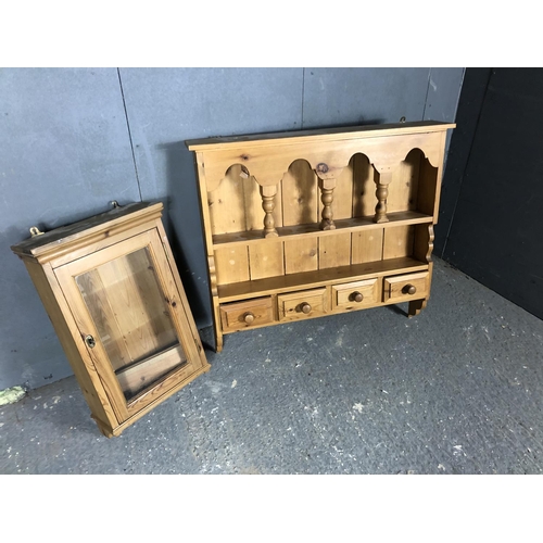 60 - A wall hanging pine shelf with four drawers together with a wall hanging pine cabinet
