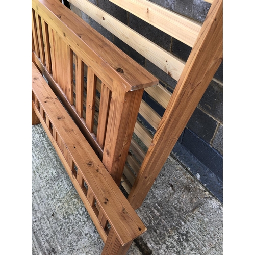 105 - A solid modern pine double bed frame