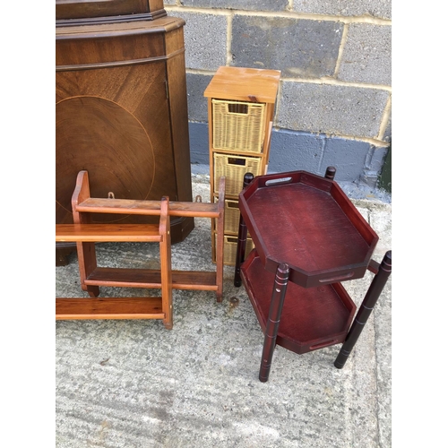 106 - A reproduction corner cabinet together with 2 pine shelves, wicker drawers, trolley and a rack