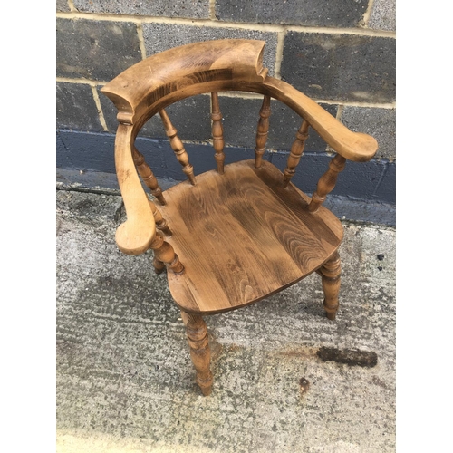 122 - A smokers bow elbow chair