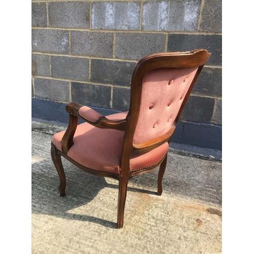 125 - A French style pink upholstered armchair