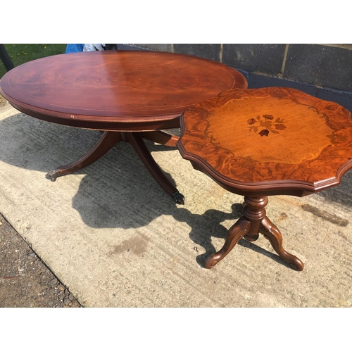 126 - Two reproduction mahogany coffee tables