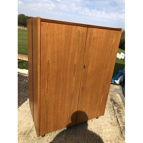 131 - A mid century 'home office' desk by Newcraft furniture with fitted interior and sliding writing surf... 