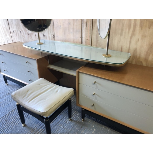 140 - A g Plan dressing chest unit designed by E Gomme. Two light oak chests of three connected by a float... 