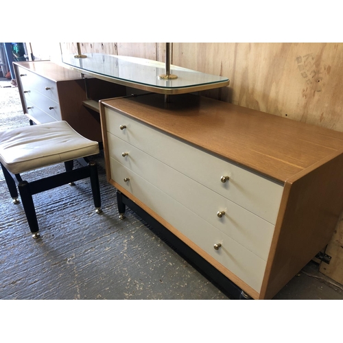 140 - A g Plan dressing chest unit designed by E Gomme. Two light oak chests of three connected by a float... 