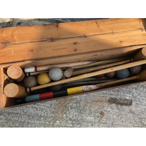 147 - A vintage wooden cased croquet set