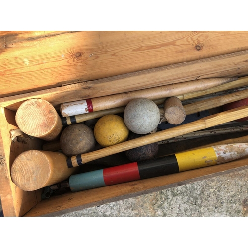 147 - A vintage wooden cased croquet set