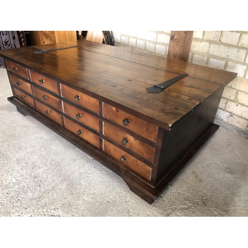 154 - A modern hardwood multi drawer coffee table with a lift up top