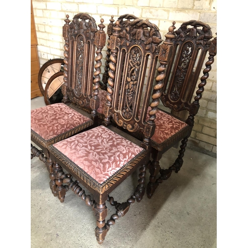 158 - A set of gothic oak high back dining chairs