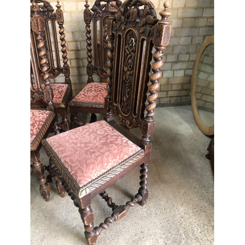 158 - A set of gothic oak high back dining chairs