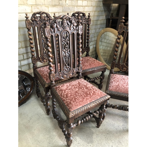 158 - A set of gothic oak high back dining chairs