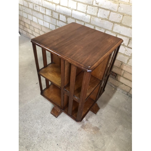 164 - A small oak revolving Canterbury bookcase