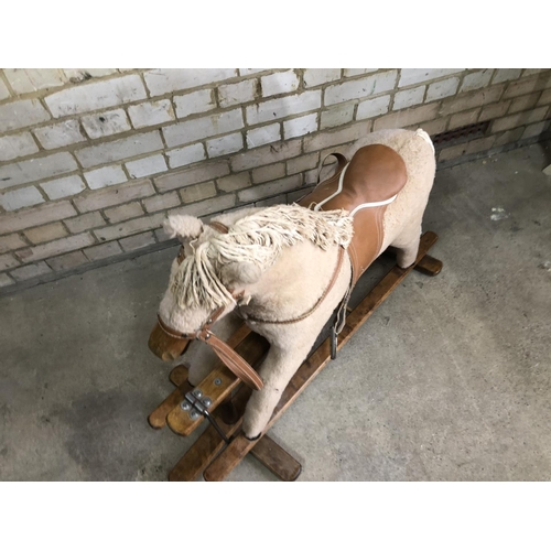 166 - A mamas and papas swing rocking horse