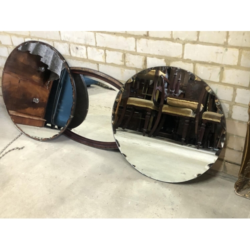 169 - A pair of frameless circular mirrors together with a mahogany framed mirror