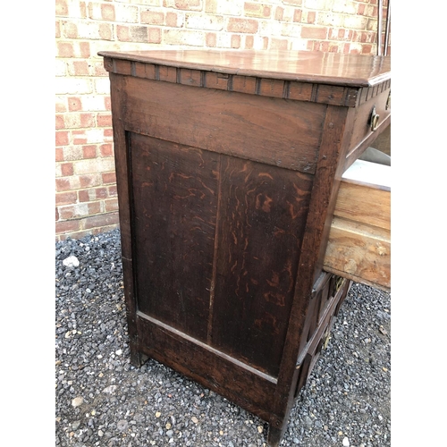 17 - A continental early oak chest of four drawers 104x57x98