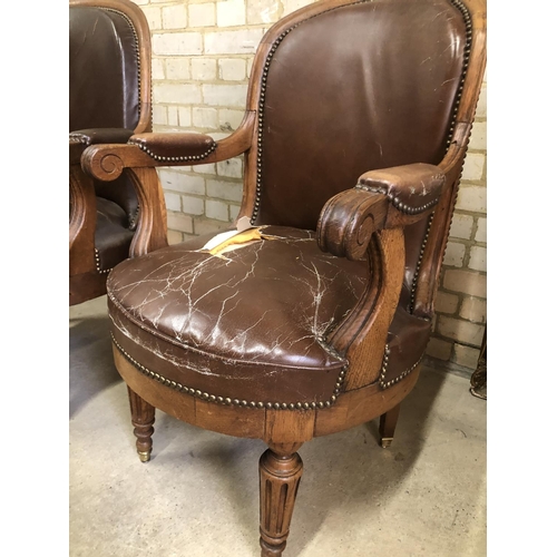 171 - A pair of Victorian oak framed library chairs with brass studs