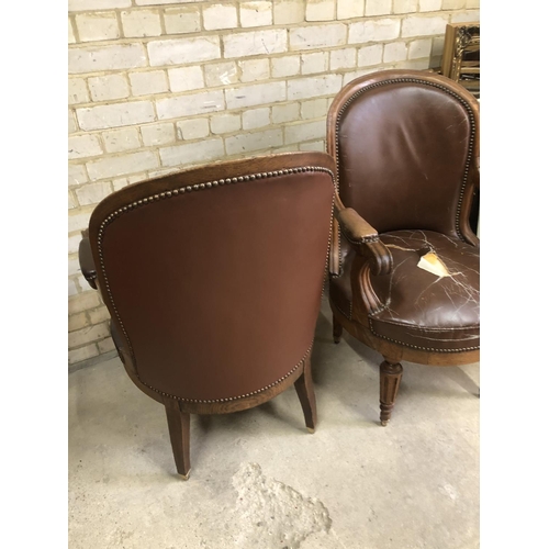 171 - A pair of Victorian oak framed library chairs with brass studs