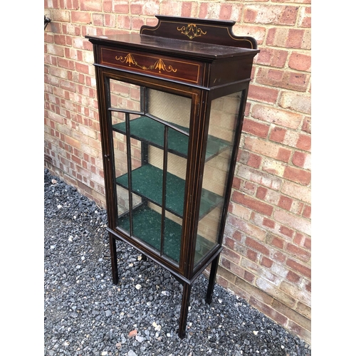 174 - An inlaid mahogany Single door cabinet