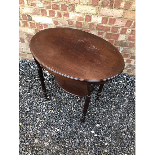 18 - An oval mahogany occasional table