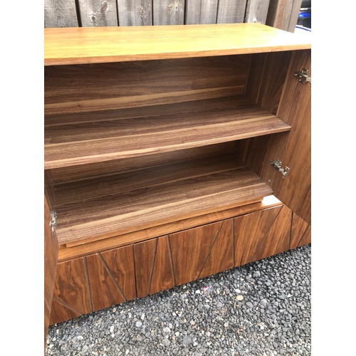 187 - A set of three modern sideboard units together with a matching shelf (one hinder broken)