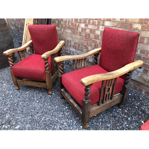 188 - A pair of early 20th century oak reclining easy chairs with barley Twist frame and red upholstery