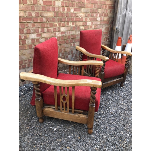 188 - A pair of early 20th century oak reclining easy chairs with barley Twist frame and red upholstery