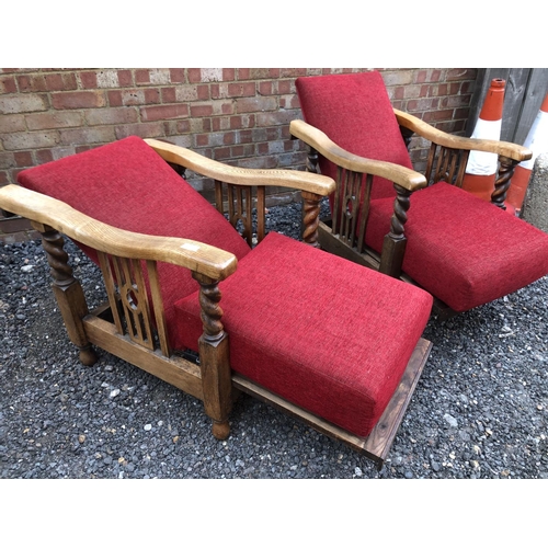 188 - A pair of early 20th century oak reclining easy chairs with barley Twist frame and red upholstery