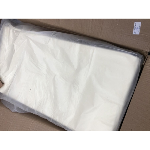 190 - Two boxes of new unused cream table linen