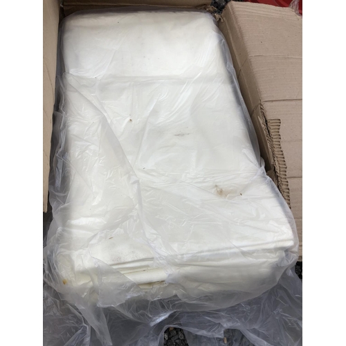 190 - Two boxes of new unused cream table linen