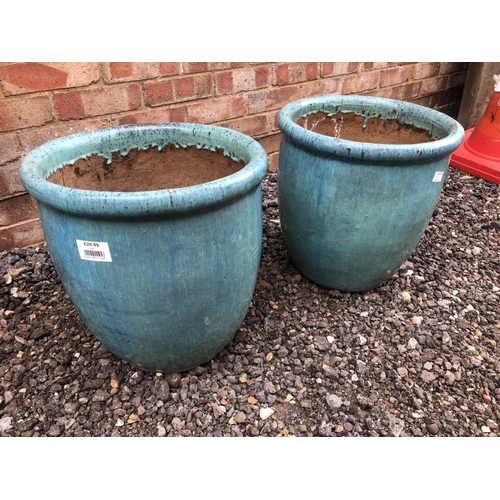 191 - A pair of light blue tall garden planters