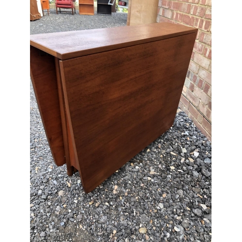 201 - A mid century teak drop leaf table