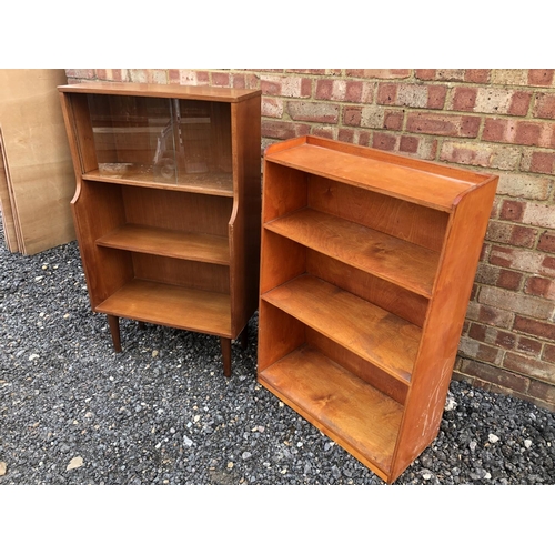 202 - A glazed teak bookcase together with an open plywood bookcase