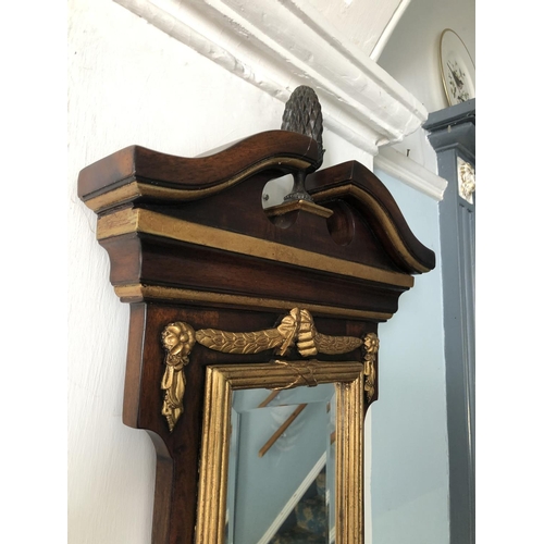 226 - A reproduction mahogany hall mirror shelf with gold gilt decoration 150cm high