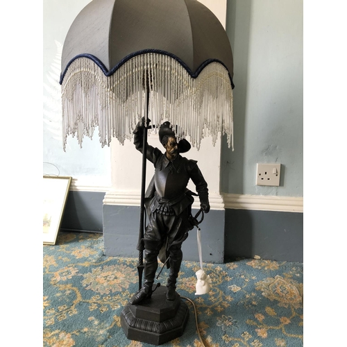 227 - A spelter figure table lamp with shade