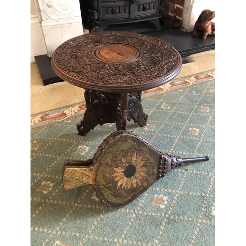 232 - A carved occasional table together with a set of decorative bellows