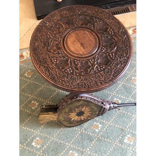 232 - A carved occasional table together with a set of decorative bellows