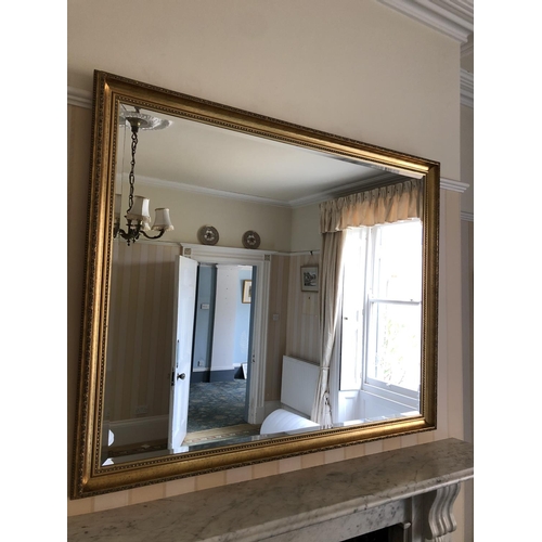 233 - A large gold gilt framed overmantle mirror 123x100