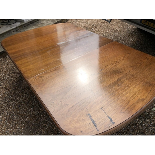 240 - A large Victorian oak wind out dining table with two extension leaves measures 276x142cm full extens... 