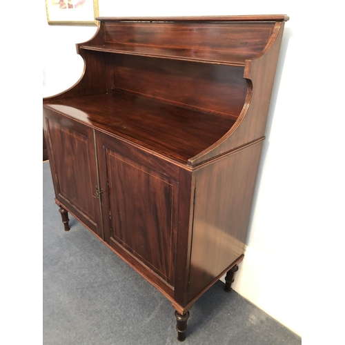 244 - An Edwardian buffet sideboard, gallery back with a singl shelf over a two door cupboard 110x44x120