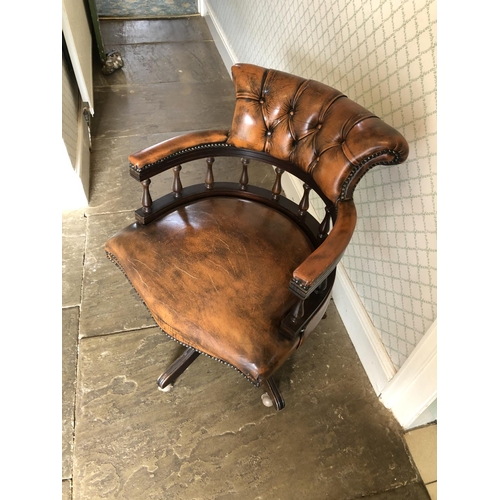 248 - A brown leather Chesterfield Captains desk chair