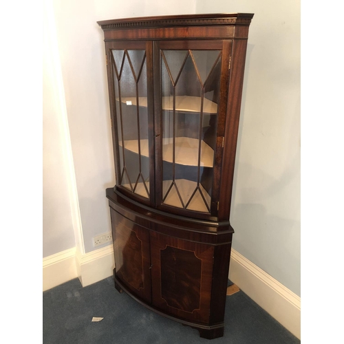 251 - A reproduction double door mahogany corner display cabinet