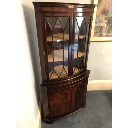 251 - A reproduction double door mahogany corner display cabinet