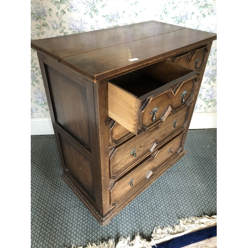 252 - A Jacobean style oak chest of five drawers with brass drop handles 91x50x105