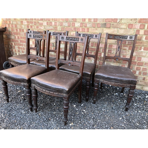 26 - A set of six Edwardian mahogany dining chairs with carved decoration