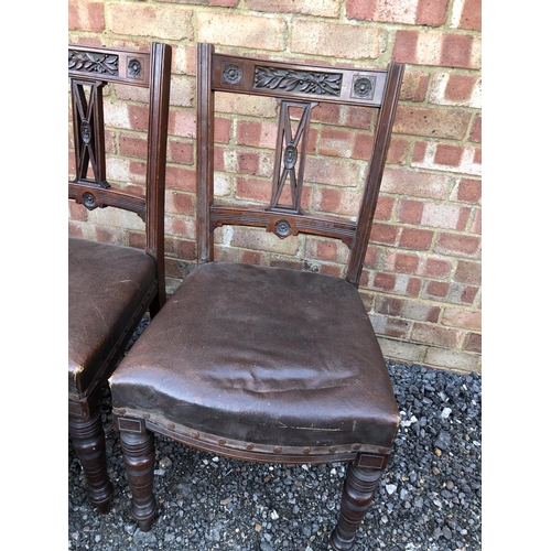 26 - A set of six Edwardian mahogany dining chairs with carved decoration