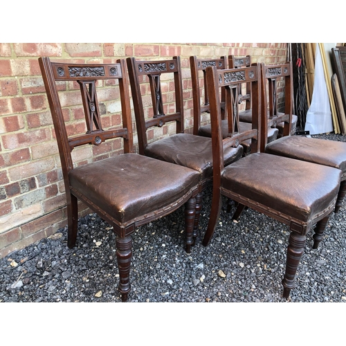 26 - A set of six Edwardian mahogany dining chairs with carved decoration