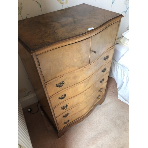 260 - A serpentine walnut gentlemans tallboy, cupboard top over five drawers 78x50x123